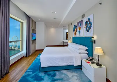 Premium One bedroom, fully furnished spacious apartment with balcony and partial sea view.