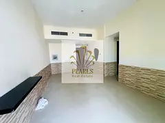 Annual rent in Pearl Towers, Al Rashidiya 1, Ajman, 2-bedroom apartment with hall, 2 bathrooms, balc