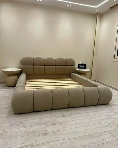 Modern tufted low-profile king-size upholstered bed frame