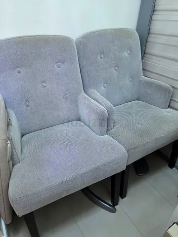 Two Light grey upholstered lounge armchair in good condition