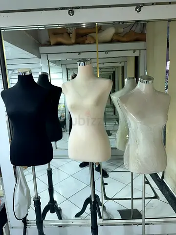 Set of 10 female dress forms/mannequin torsos on stands - good condition