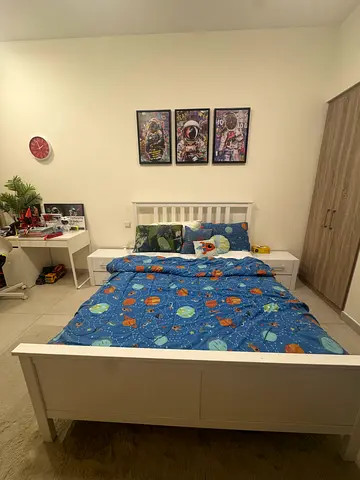 Bed with side tables