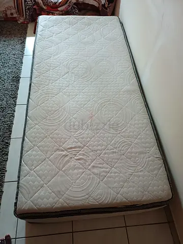 Single mattress in good used condition — firm support