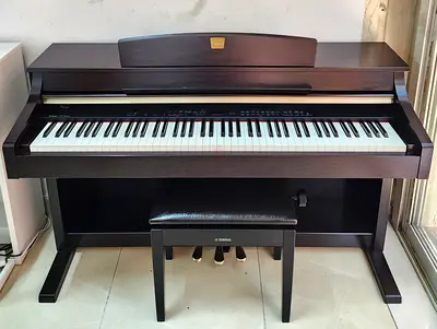 The Yamaha Clavinova CLP-340 is a mid-to-high range digital piano featuring an 88-key Graded Hammer