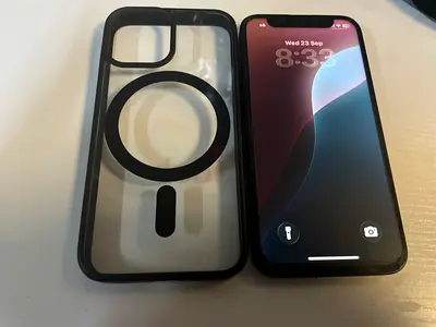 iPhone 13 mini in good condition with MagSafe clear case included