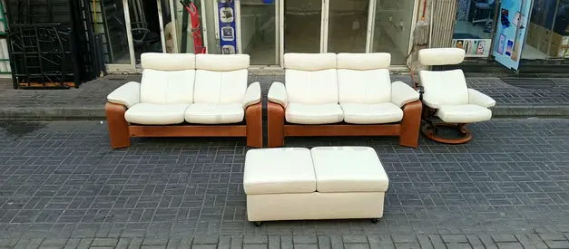 Cream leather 3-piece sofa set with ottoman