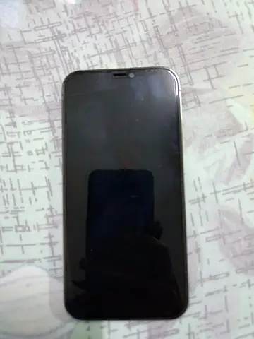 I phone 12 pro with charger and box