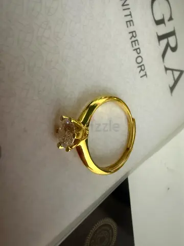 Golden Solitaire Ring with Center Diamond