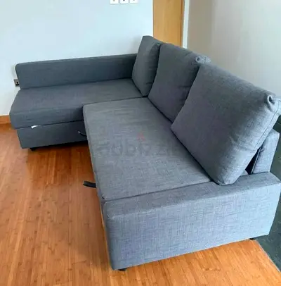 Grey L-shaped Fabric Sofa bed with Chaise - Good Condition