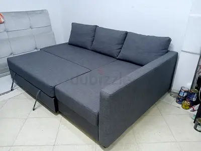 Gray L-shaped Sofa Bed with Storage — Good Condition