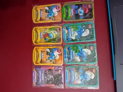 Lot of 8 McDonald's The Smurfs Happy Meal collectible figures (sealed cards)