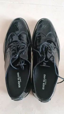 Pair of black patent River Island Brogue Shoes