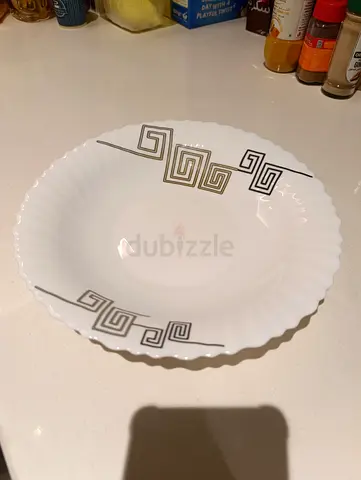 Set of decorative white ceramic soup/dessert bowls with geometric pattern