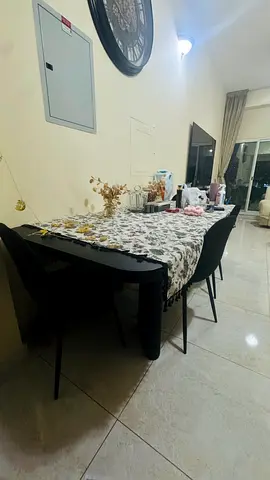 Dining table with 6 chairs - good condition, modern black set