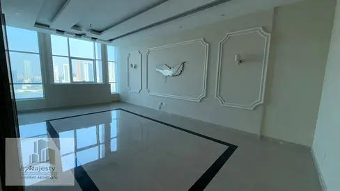 For rent: a unique apartment in Al Nakheel Tower 1 with a stunning front view of Al Mamzar Lake, open view with a parking space.