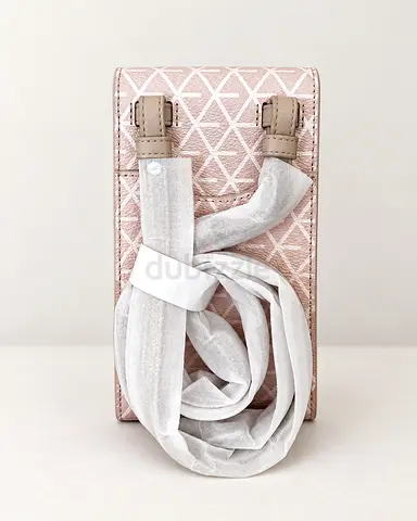 Small pink crossbody phone bag with adjustable strap