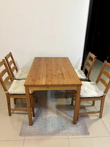 Dining table set with cushions