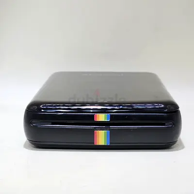 BRANDED Polaroid ZIP Mobile Printer, a compact, pocket-sized wireless photo printer.