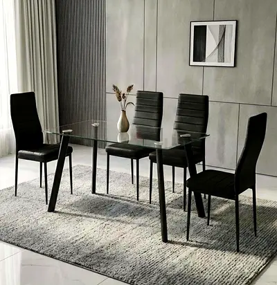 Like new / Urgent Sale /Glass Top Dining Table with 4 Black Upholstered Chairs