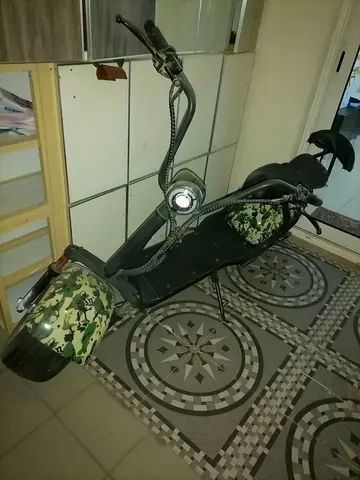 Used Electric big Harley Cruiser Scooter with Wide Deck and Camouflage Fenders
