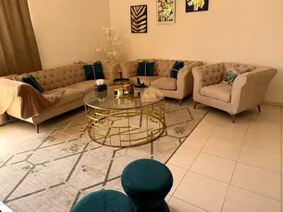 Beige L-shaped Chesterfield Sofa Set with Armchair and Glass Coffee Table