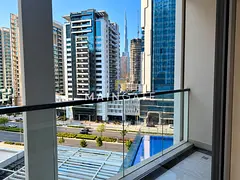 Fully Furnished Studio | Burj Khalifa & Pool View | Business Bay