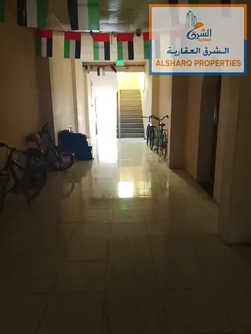 Labor camp with 75 rooms, four walled compounds, an office, and 5 shops for sale in Industrial Area 1, offering a 14% return.