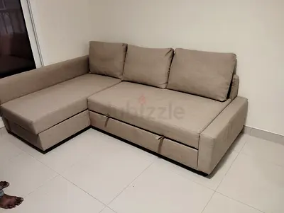 Beige L-shaped Sofa with Storage - Good Condition