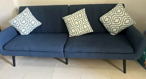 Blue 3-seatersofa cum bed fabric sofa with cushions - good condition