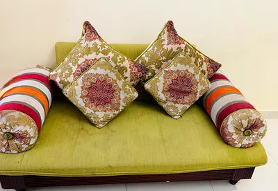 Green Fabric 5 seater Sofa Bed with Decorative Cushions
