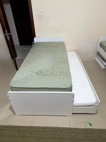 White single trundle bed with two mattresses - used bed