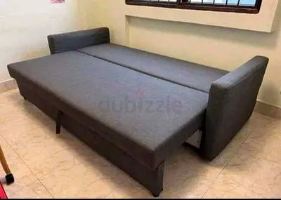 Grey fabric sofa bed - converts to double bed, good condition