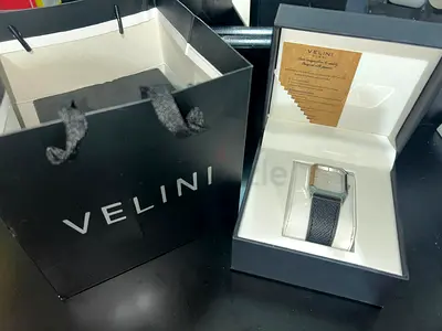 Velini men's wrist watch in original box — excellent condition with warranty