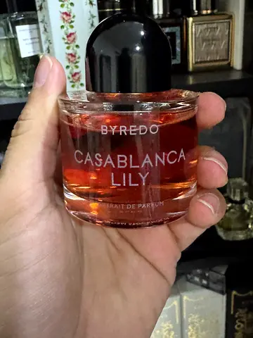Used women's fragrance bottle (partially full) - authentic