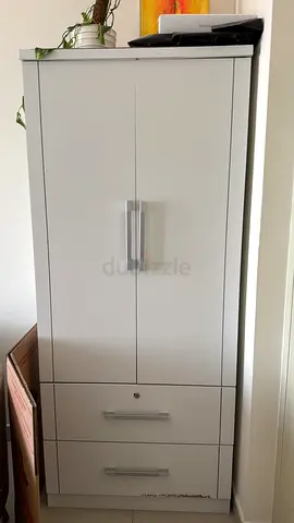 White tall storage cabinet with two drawers – good condition