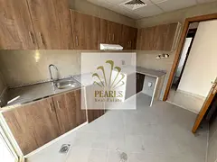 Annual rent in Ajman Al Nakheel near Corniche, brand-new first tenant, 2 master bedrooms + hall, 3 b