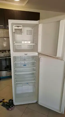 Used upright refrigerator / freezer unit - good working condition