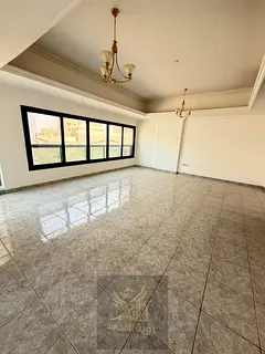 For Annual Rent in Sharjah Al Majaz 2 Beautiful two-bedroom apartment with a spacious living room, i