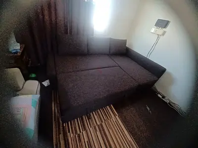 Dark brown L shape  sofa bed in good  condition