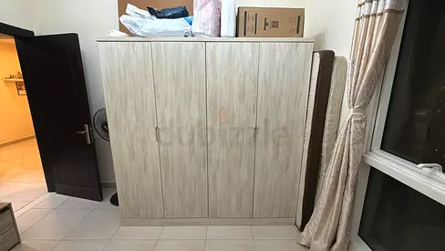 Modern 4-Door Wardrobe in Light Wood Finish