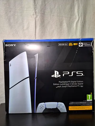 Ps5 slim digital edition with 2 controllers Marvel's Spider-M and charging station and box included