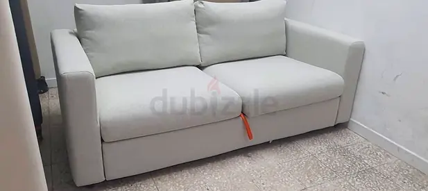 Comfortable light grey 2-seater sofa