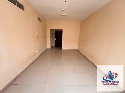2BR in Al Qilaya, balcony, 3 baths, both master, central A/C & gas, family building, 4/6 payments, near all services.