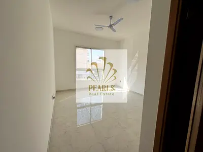 Luxury 1BR for Annual Rent in Al Nakhil, Brand-New First Occupant, Near Ajman Corniche, Balcony, Central AC & Built-in Wardrobes.