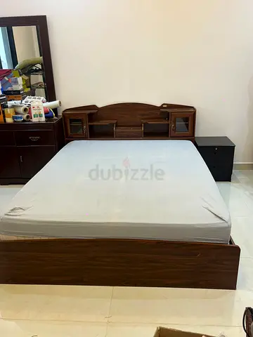 Bed with side table