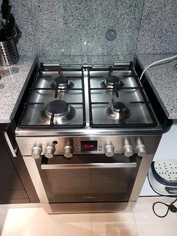 Bosch 4-Burner Gas Cooker with Oven — Stainless Steel, Good Condition