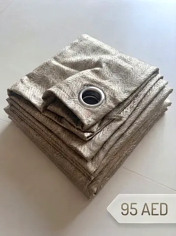 Set of 2 Silver Grommet Curtains (Like New) - 95 AED