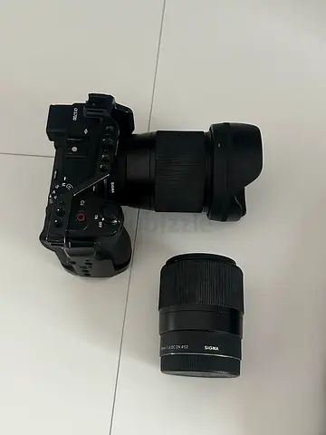 Sony A6700 camera with Sigma 16mm lens + extra Sigma 30mm lens