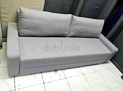 Light grey 3-seater sofa with removable back cushions - good condition