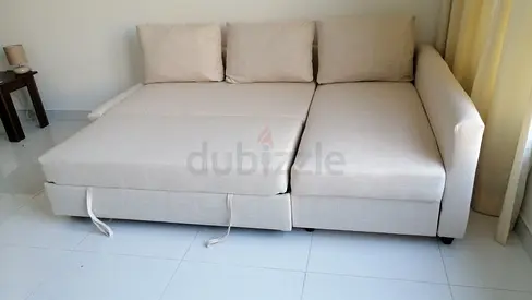 Light beige 3-seater sofa bed with chaise lounge - good condition